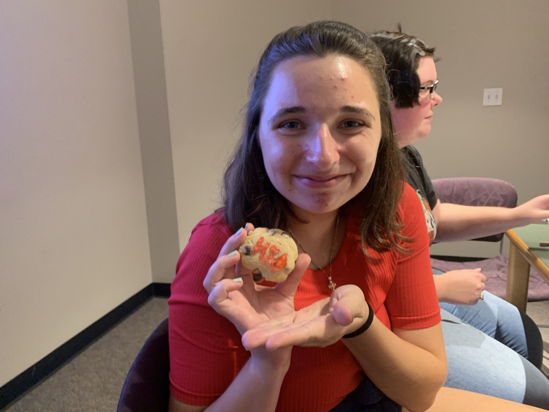 Student with a decorated cookie