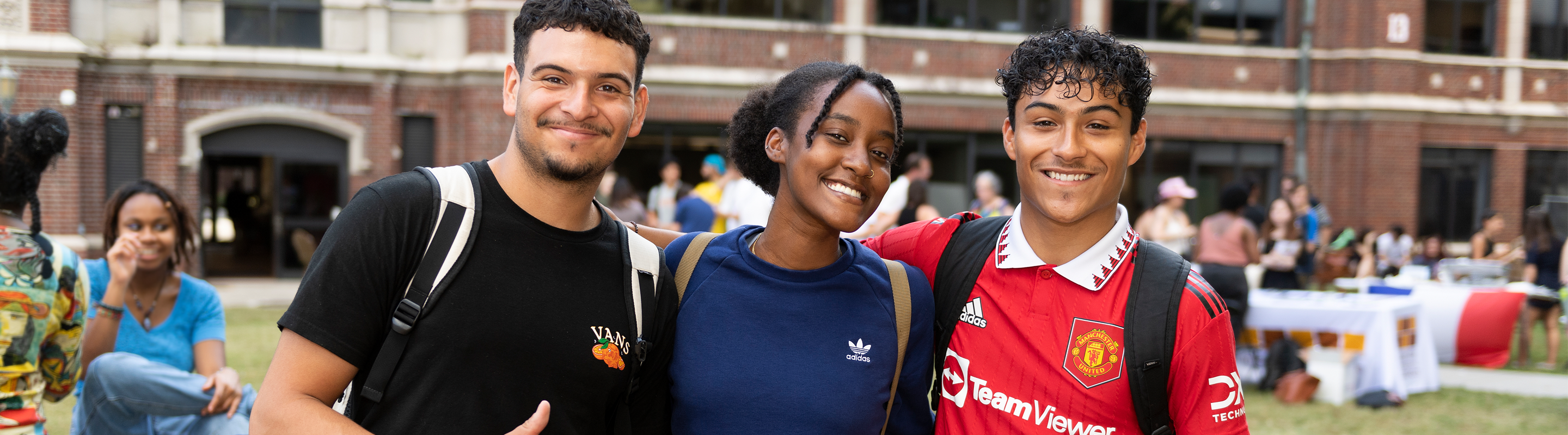 Three Loyola Students Smiling
