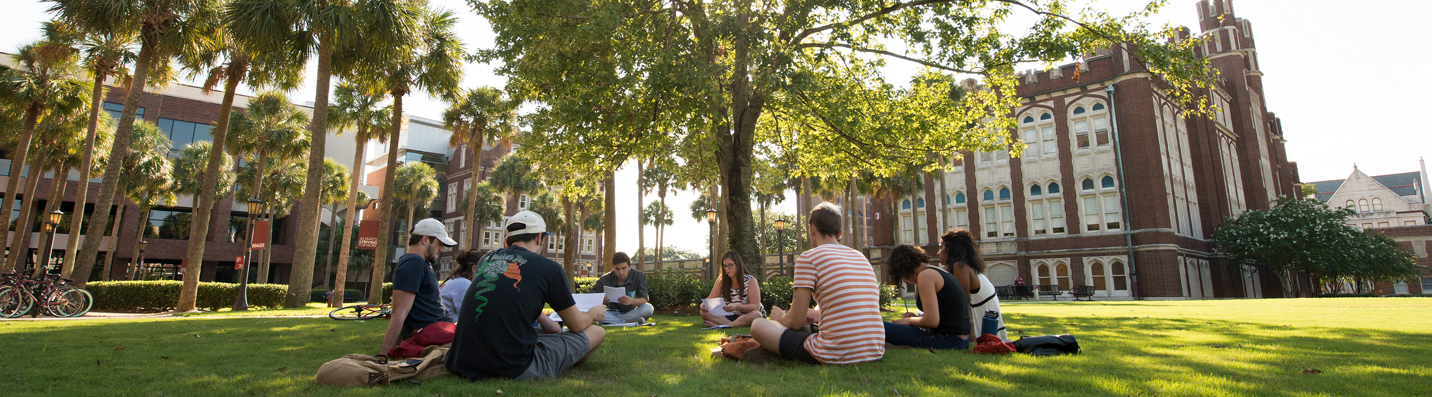 Loyola Students Sit Outdoors for a Lecture