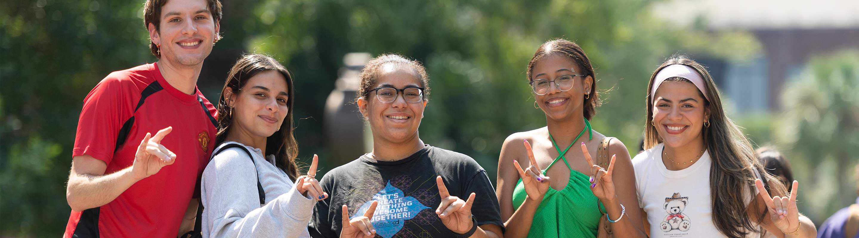 Five Loyola Students Posing on Campus