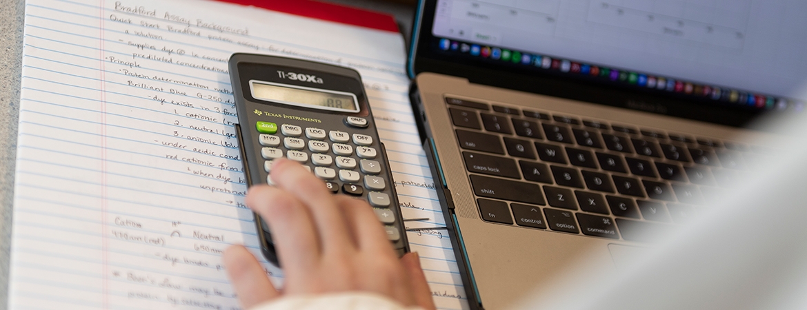 Student Using Calculator