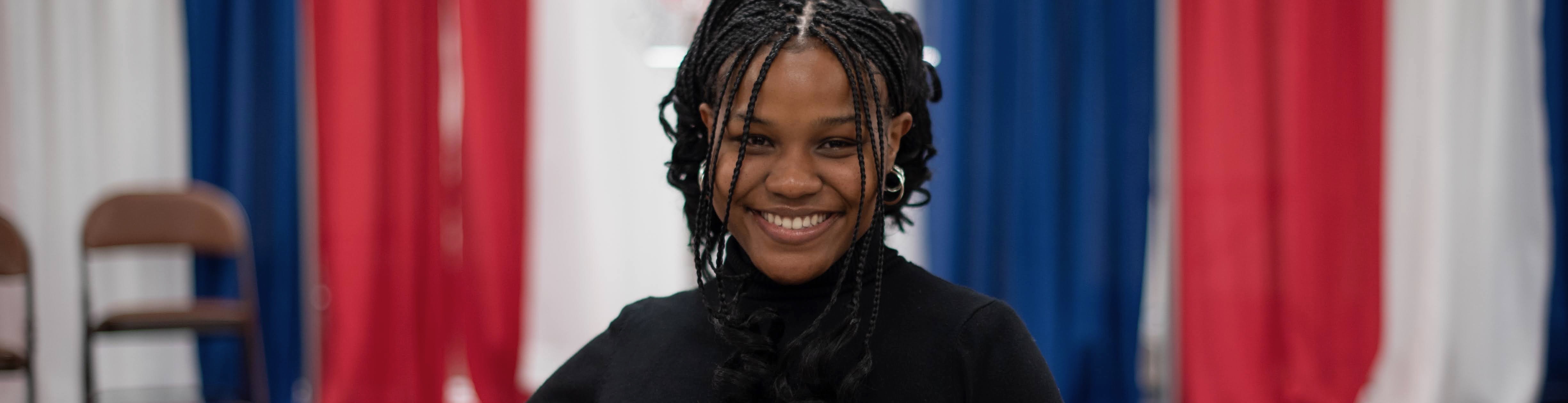 LoriElle Adams holding certificate