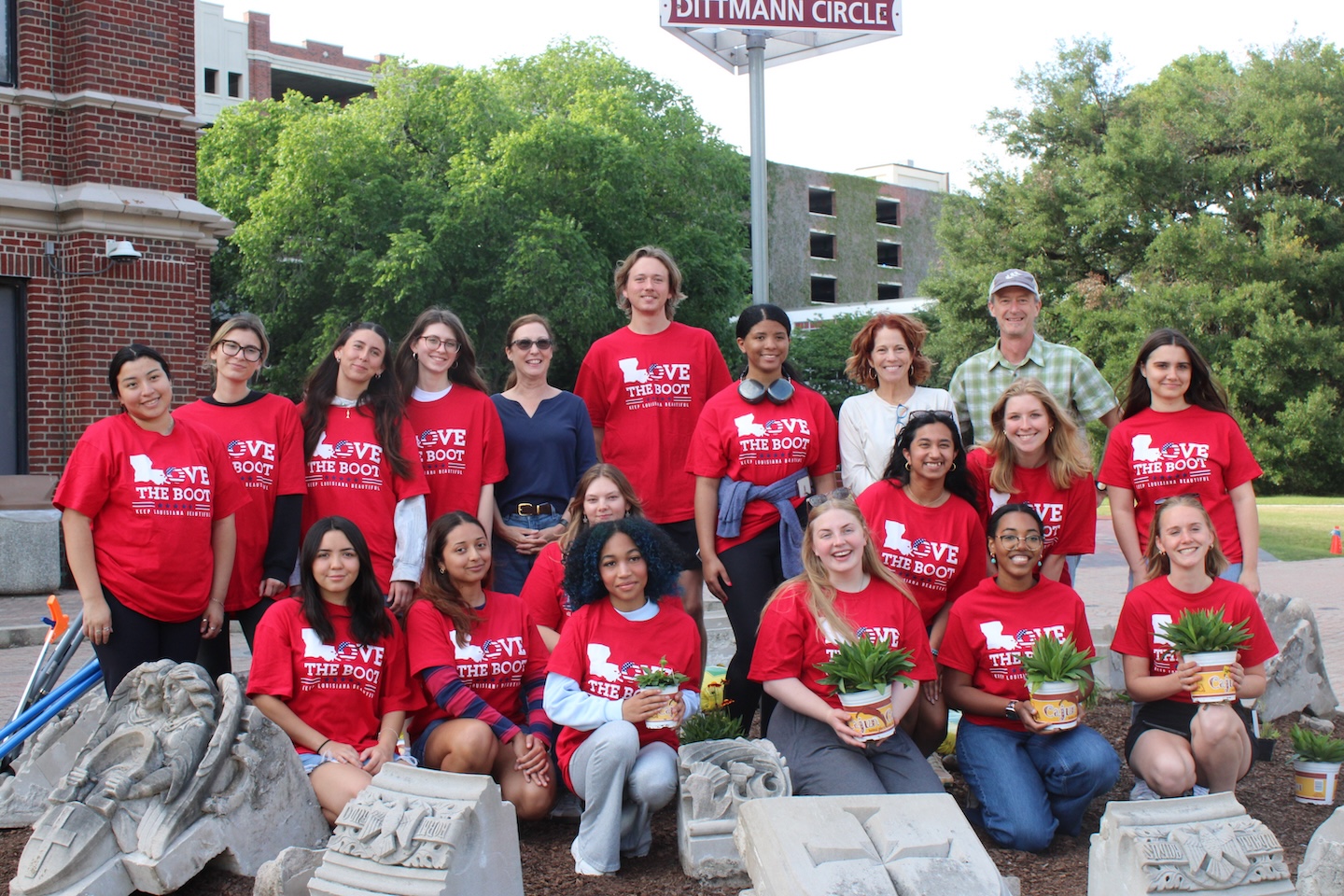 Students at Loyola's pollinator garden