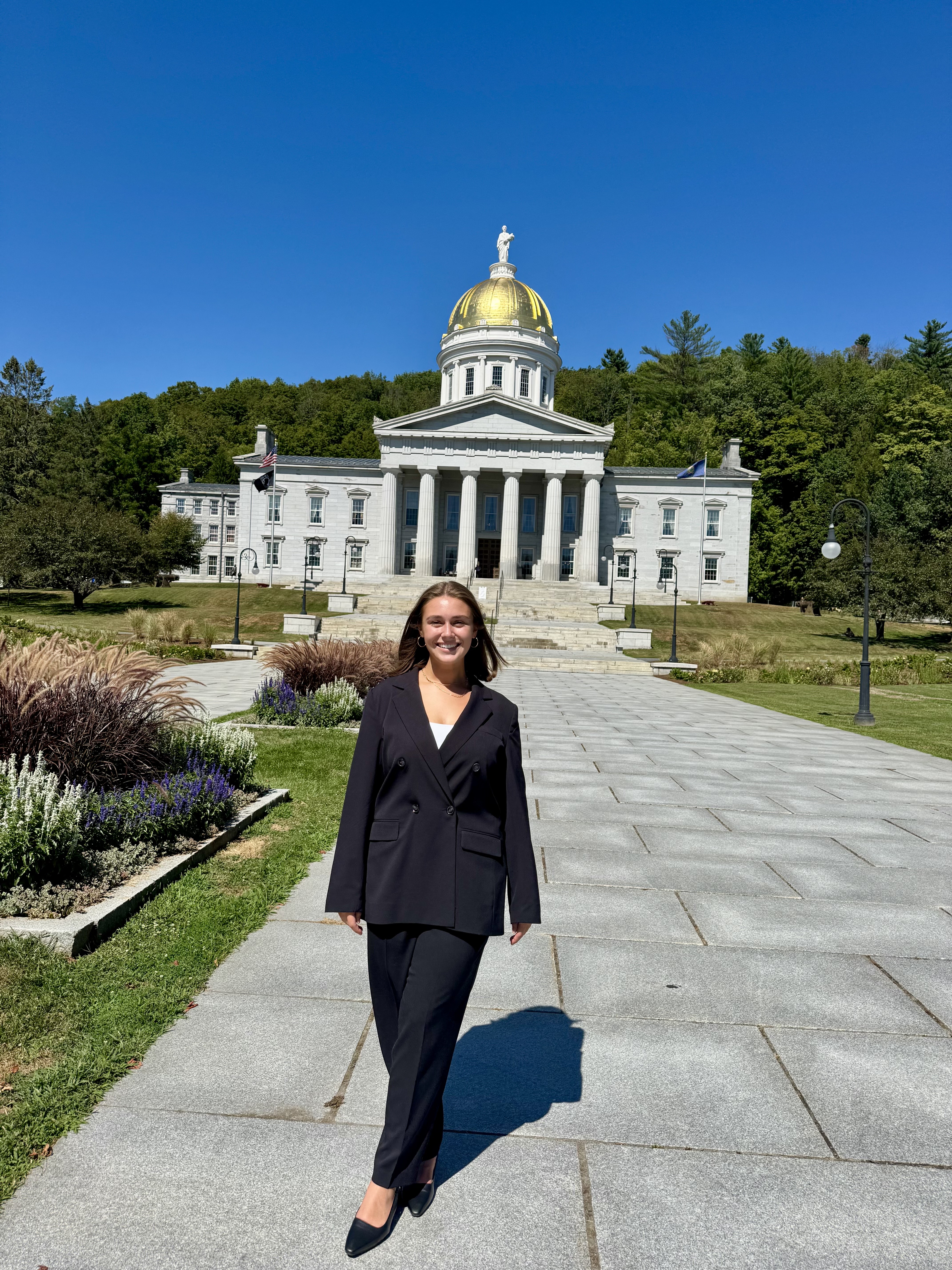 Jacqueline Mutter '24 Alum in Front of the Vermont State Capital