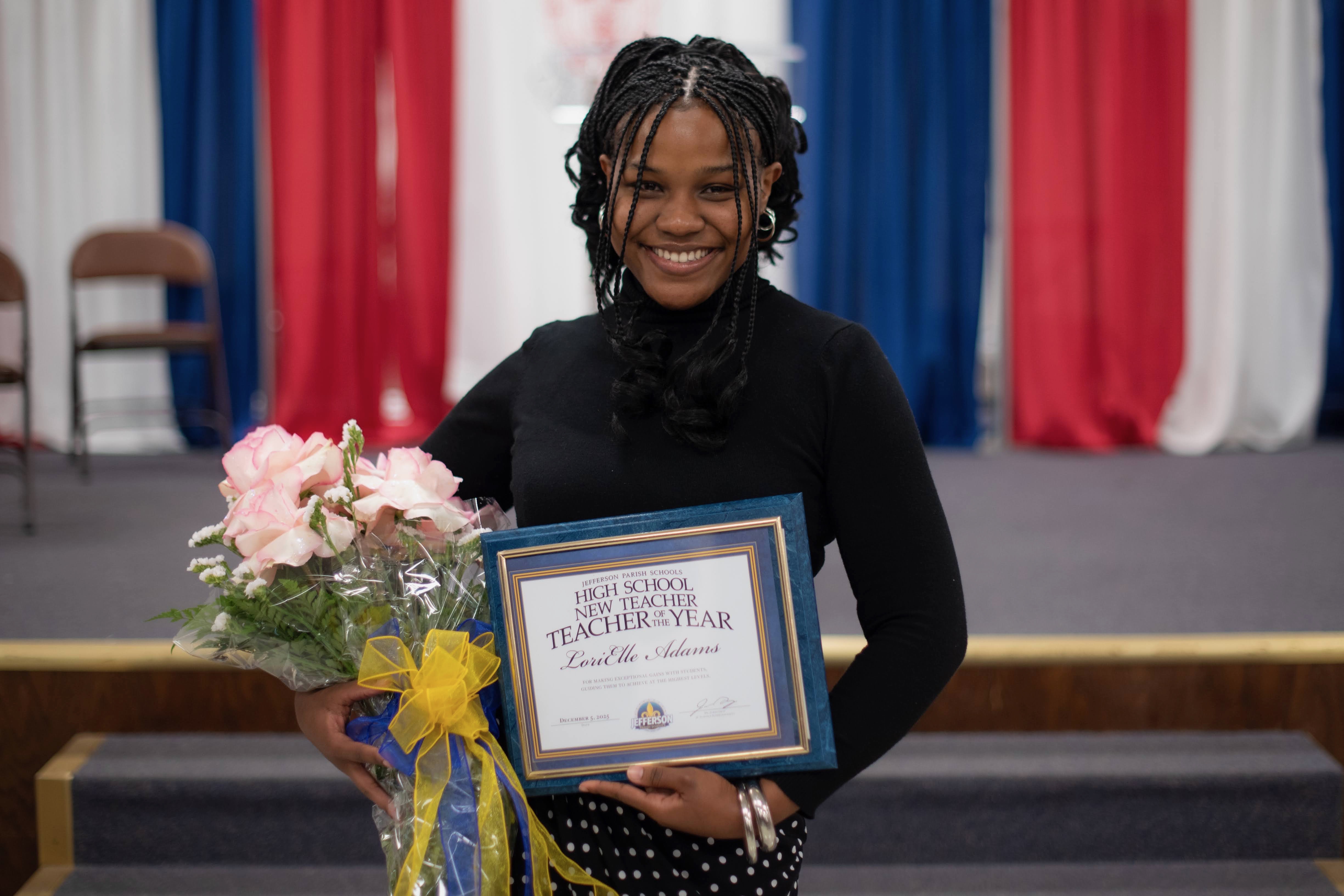 LoriElle Adams holding certificate.